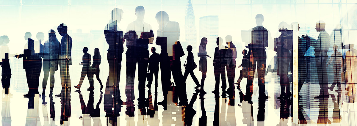 Silhouettes of business people working in an office